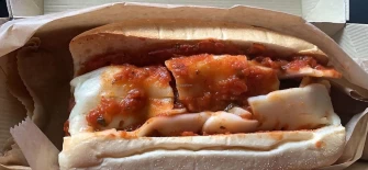Meatball Sub with Gardein meatballs, Rao’s tomato sauce and Violife mozzarella cheese