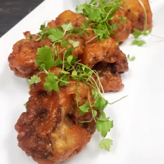 buffalo cauliflower At 3 Brothers Vegan Cafe In Copiague